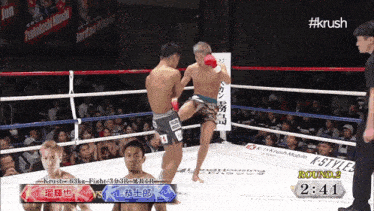 two fighters in a boxing ring with #krush on the bottom