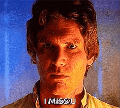 a close up of a man 's face with the words `` i miss you '' written on his chest .