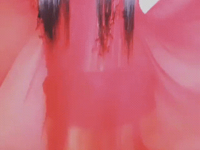 a close up of a person 's hair with blood dripping from it