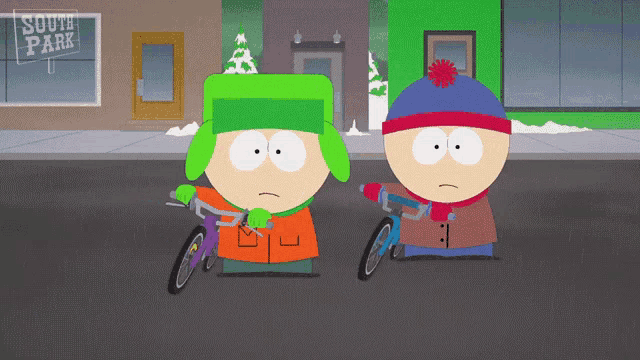 two south park characters riding bicycles on a street