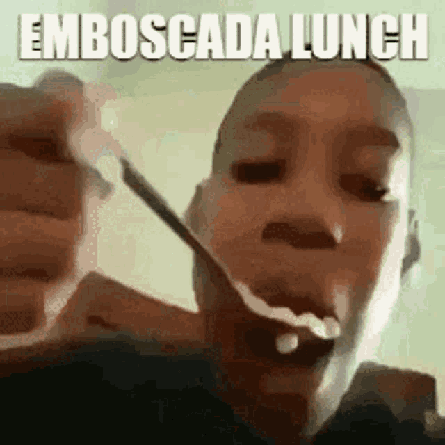 a person is eating a spoonful of food with the words emboscada lunch written on it .