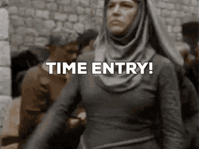 a woman in a hijab is walking down a street with the words `` time entry '' written on the screen .