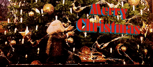 a christmas tree with the words merry christmas written in red