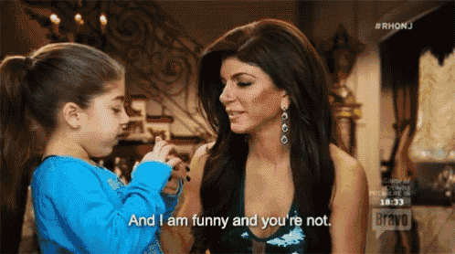 a woman and a little girl are talking and the little girl is saying and i am funny and you 're not
