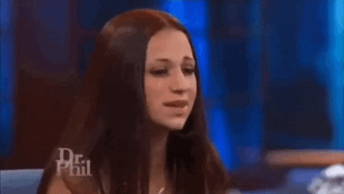 a group of people are sitting in chairs on a dr phil show .