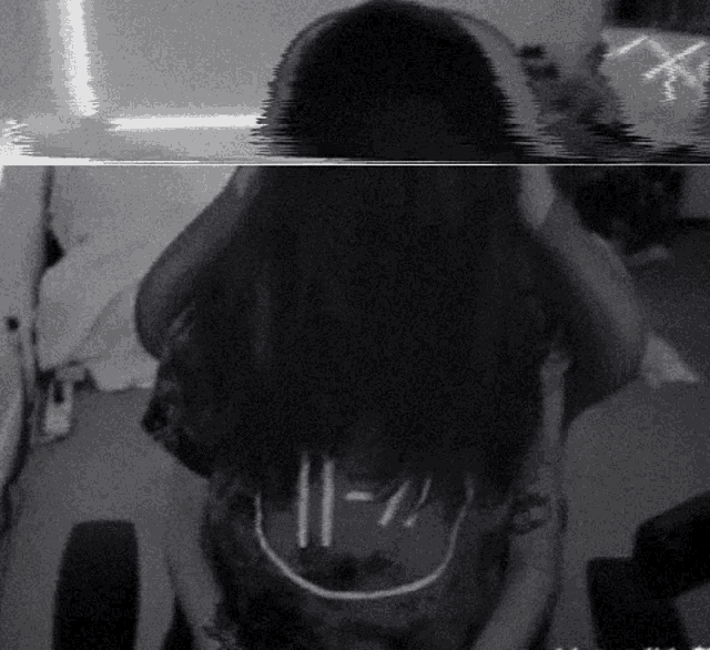 a black and white image of a person with the number 11 on their chest