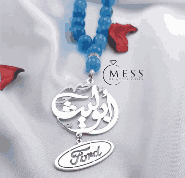 a mess of accessories necklace with a ford pendant