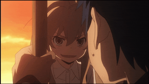 a man and a girl are looking at each other and the girl has a very angry look on her face