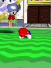 a cartoon character is crawling on the ground in a video game while wearing a blue hat .