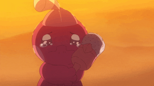 a cartoon character is crying while holding a piece of bread