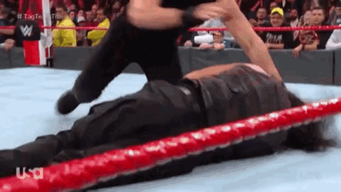 Dean Ambrose Attacking GIF - Dean Ambrose Attacking Beat Up GIFs