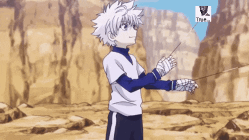 a boy with white hair is holding a fishing rod in a desert landscape .