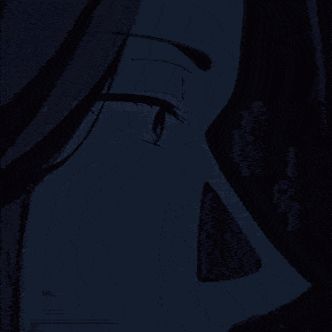 a close up of a person 's face with a blue background