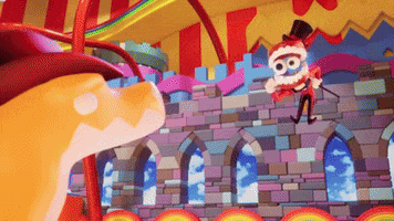 a cartoon character in a top hat is standing in front of a colorful castle .