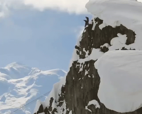 Diving Off A Mountain GIF - Red Bull Mountain Dive GIFs