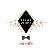 a logo for trim & vines with a bow tie .