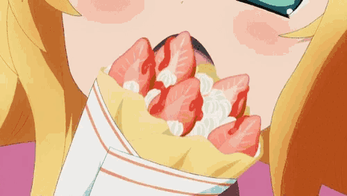 a close up of a girl eating a crepe with strawberries and whipped cream