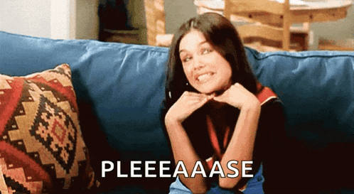a woman is sitting on a blue couch with the words pleeeaase written on the bottom