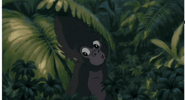 a cartoon gorilla is standing in the jungle looking at something