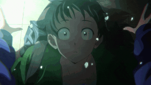 a close up of a person 's face with a surprised look on his face