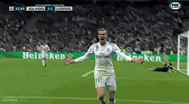 a soccer player is celebrating a goal during a game .