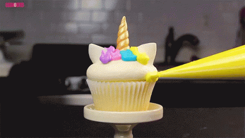 Unicorn Cupcake GIF - Spin Frosting Yum GIFs