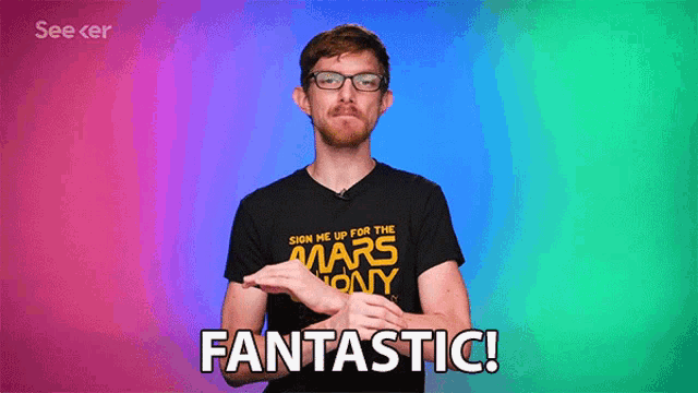 a man with glasses and a black shirt that says fantastic