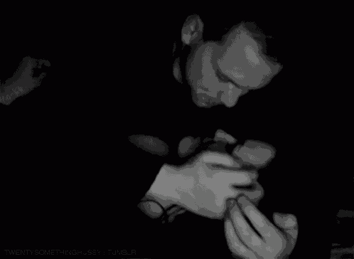 a black and white photo of a man kissing a woman with the words twentysomethinghussy tumblr in the bottom right corner