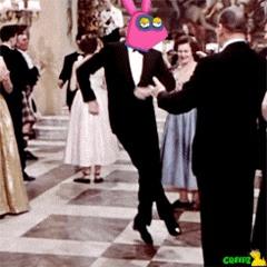 a man in a tuxedo is dancing with a pink rabbit on his head