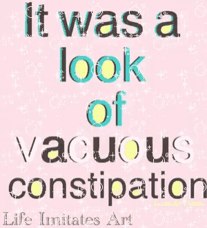 a pink sign that says it was a look of vacuum constipation