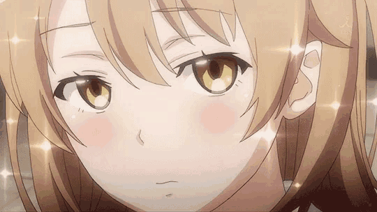 a close up of a anime girl 's face with sparkles coming out of her eyes