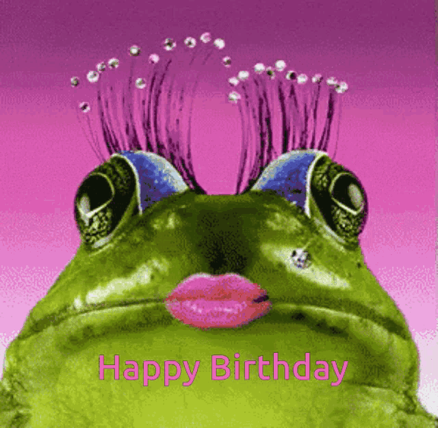 a green frog with pink lips and rhinestones on its eyes and the words happy birthday on the bottom