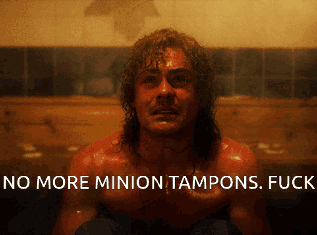 a shirtless man is sitting in a bathtub with the words no more minion tampons