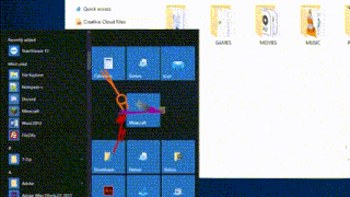 a computer screen with a clock on it and a red arrow pointing to the start menu