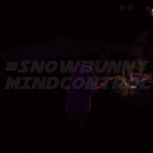 a cartoon character is standing in a dark room with the words #snowbunny mindcontrol behind him
