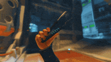 a person is holding a pair of scissors with the letters ccc on it