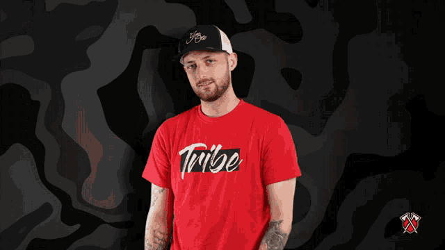a man wearing a red t-shirt that says ' toronto ' on it