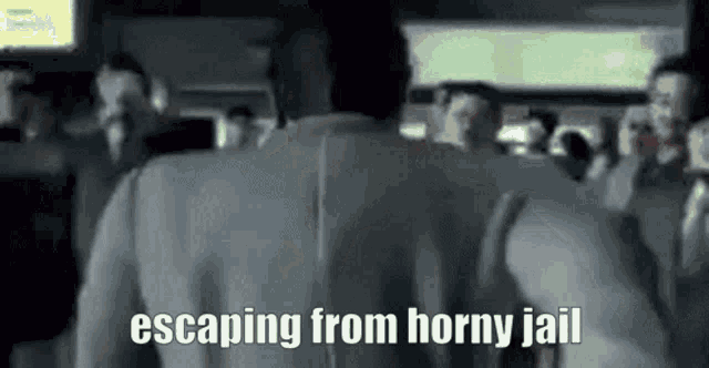 a man is escaping from a horny jail while sitting on a plane .