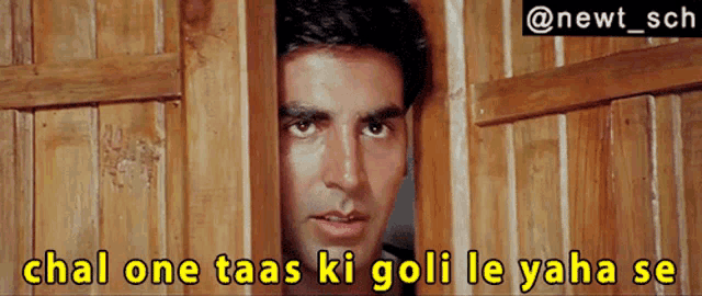 a man peeking out of a wooden door with the caption chal one taas ki goli le yaha se