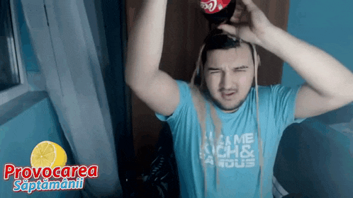 a man wearing a blue shirt that says provocarea