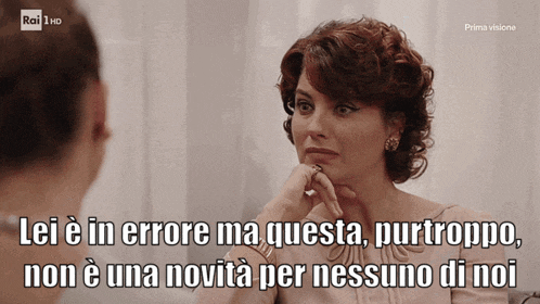 a woman is talking to another woman with rai 1 hd written in the corner