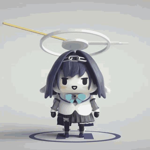 a figurine of a girl with a white halo around her head