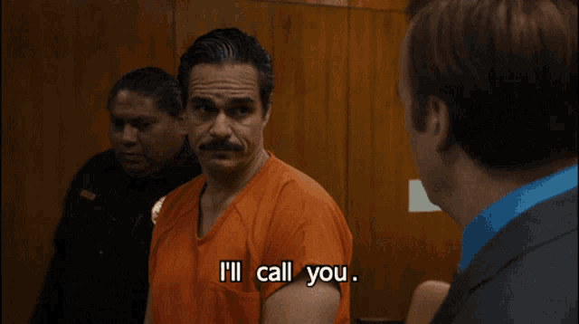 a man in a jail uniform says i 'll call you