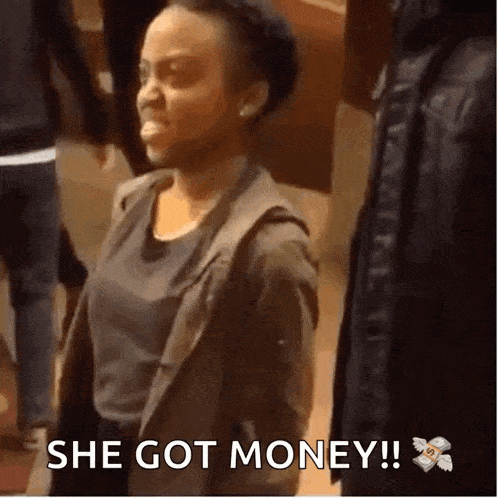 a woman is standing in front of a group of people and says she got money !