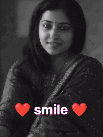 a woman is smiling in a black and white photo with the words smile behind her