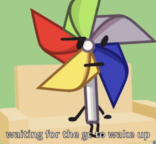 a colorful pinwheel is sitting on a couch with the words waiting for the gc to wake up below it