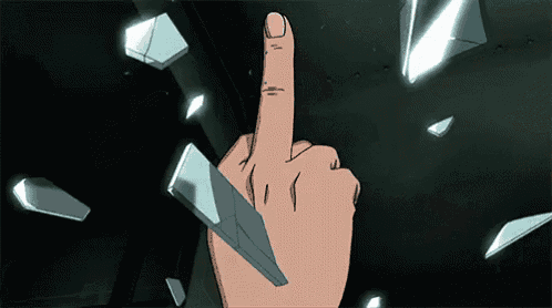 a hand is holding a piece of glass and pointing at it