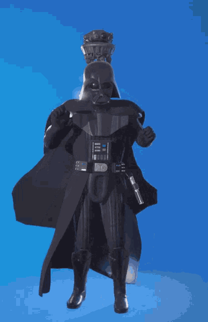 a person in a black cape is flying in the sky
