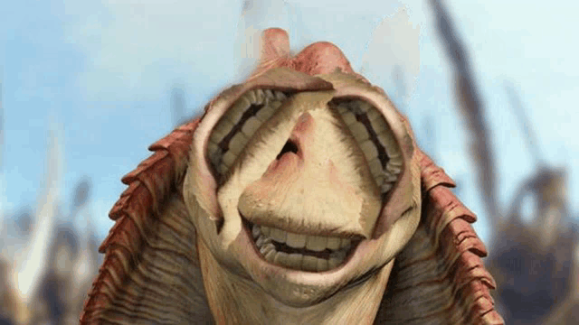 a close up of a cartoon character with a huge mouth