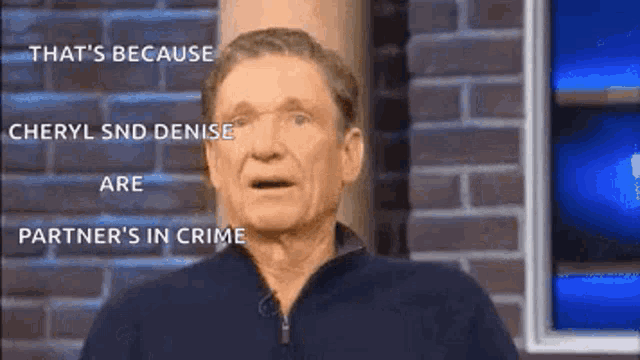 a man is standing in front of a brick wall and talking about cheryl and denise